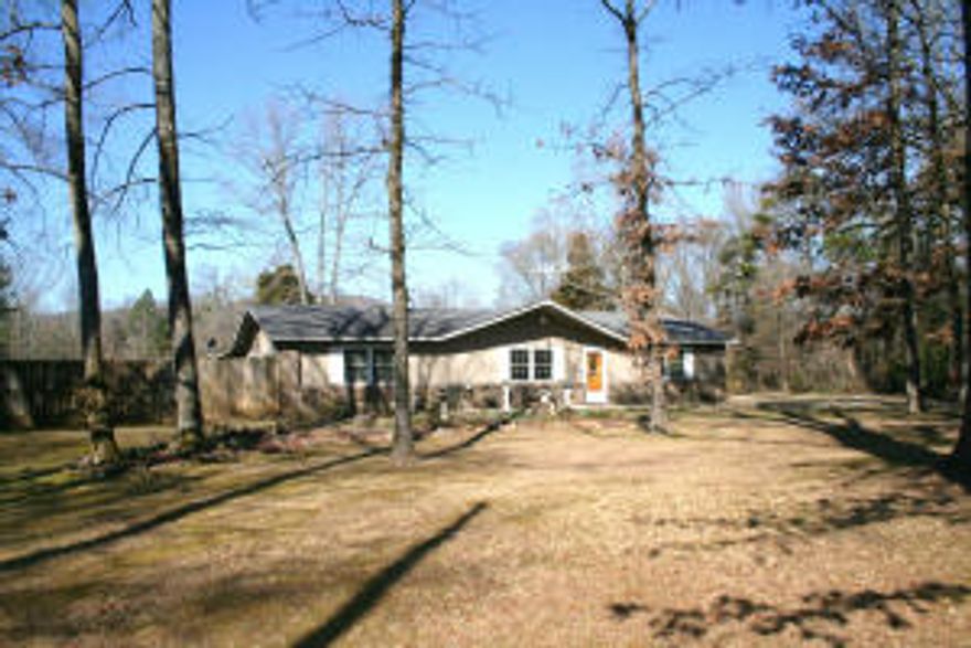 NEW UPDATES!!! THIS 3 BEDROOM/2 BATH ENERGY EFFICIENT HOME IS LOCATED ON 6.35 M/L PRIVATE ACRES JUST OUTSIDE OF DARDANELLE. IT HAS A LARGE SHOP, SWIMMING POOL, 2 LIVING AREAS, WOOD BURNING STOVE, POND, OFFICE, AND A PAVED CIRCLE DRIVE. LAND HAS A NICE BALANCE OF OPEN LAND AND WOODS WITH LOTS OF TRAILS FOR 4WHEELER RIDING.