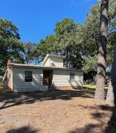 ATTENTION INVESTORS or HOUSE FLIPPERS.....This home offers 3 bedrooms, 2 full bathrooms, and sits on almost 1 acre. It has a detached metal carport, an outdoor storage building, and is located approx 6 miles from Mt Nebo State Park.This home is being sold AS IS, and will need to be a CASH sale. The sellers will not do any repairs and buyers are advised to obtain their own inspection.