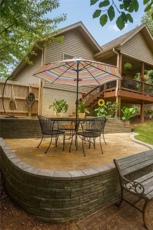 Welcome to this well maintained custom built home that sits minutes from everything in Bella Vista. This 3 bedroom, 2 bath, 1878 sq ft home is move in ready. Walk into the open floor plan with ceramic wood tile flooring, vaulted ceilings and beautiful back porch. The main suite features a large soaking tub and walk in closet. This home has many custom features with a fully landscaped yard and level front yard. Sitting on the back deck you are surrounded by large mature trees. With no neighbors on the side or back you feel like you are in the deep woods. A new stone patio is being completed in the backyard. This home has it all.