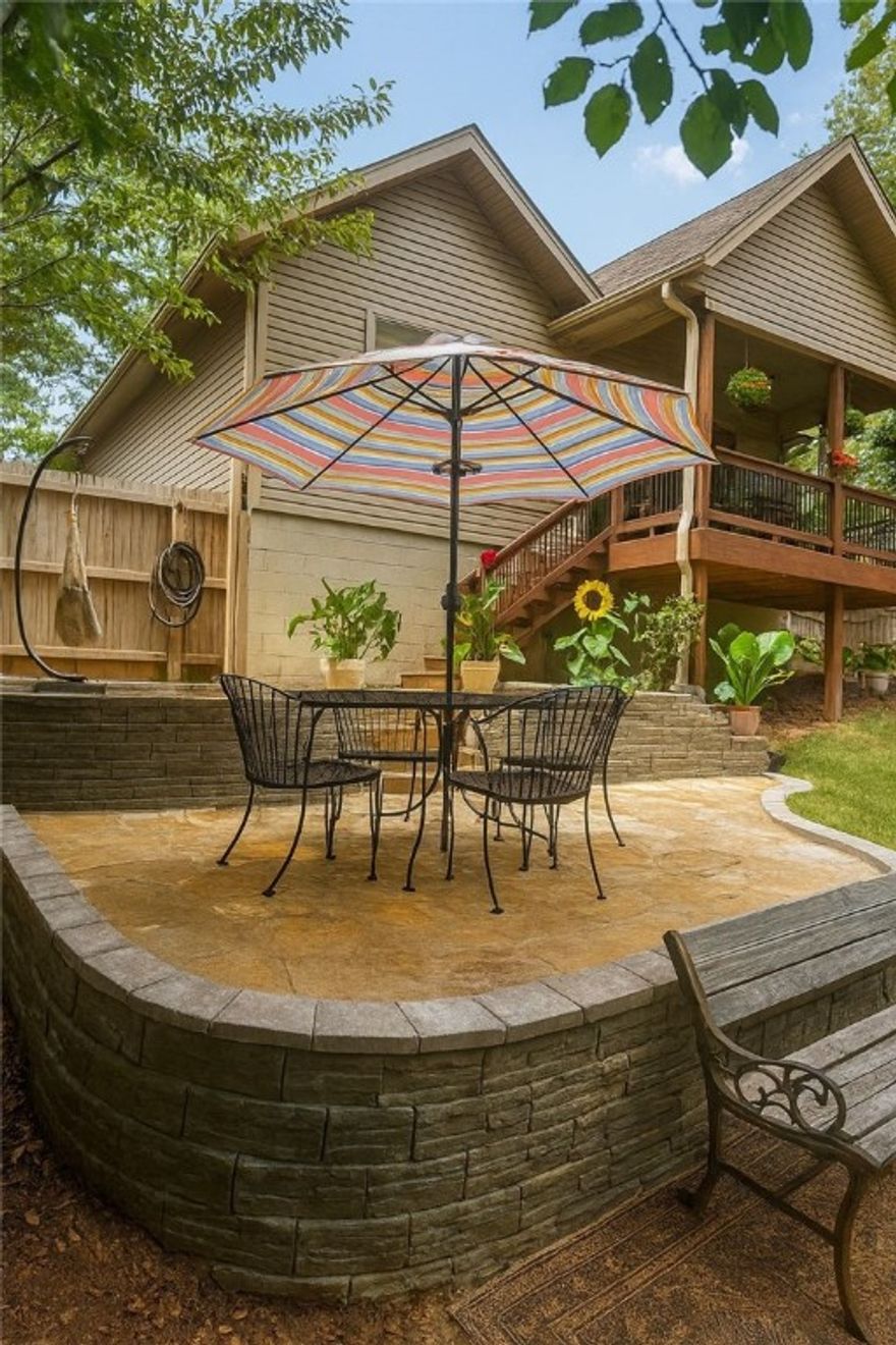 Welcome to this well maintained custom built home that sits minutes from everything in Bella Vista. This 3 bedroom, 2 bath, 1878 sq ft home is move in ready.  Walk into the open floor plan with ceramic wood tile flooring, vaulted ceilings and beautiful back porch. The main suite features a large soaking tub and walk in closet.  This home has many custom features with a fully landscaped yard and level front yard.  Sitting on the back deck you are surrounded by large mature trees.  With no neighbors on the side or back you feel like you are in the deep woods. A new stone patio is being completed in the backyard.  This home has it all.