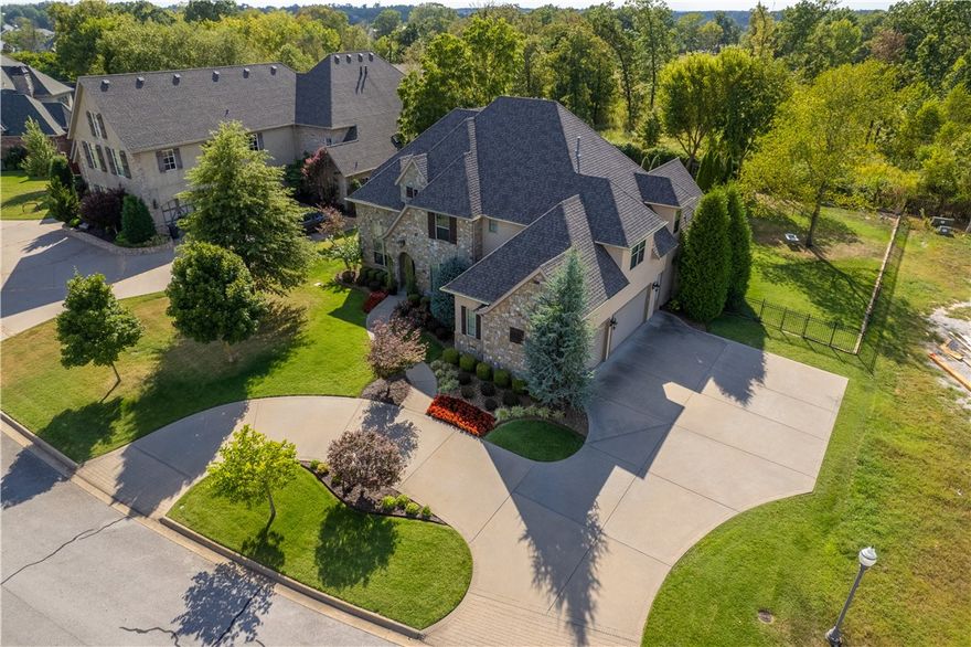 This jaw dropping custom built home located in Pinnacle Country Club has all the amenities of an at home oasis!  The private back yard is made for entertaining featuring a gas firepit, outdoor kitchen, saltwater pool with rock waterfall. This 4 BR, 3.5 BA home has upgraded appliances, walnut wood flooring, central vac, Irrigation, commercial grade hot water tank w/recirculating hot water, and more. Enter the home and be blown away with the stunning entry. Located off the entry is the home office to the left and the formal dining room to the right. Continue into the kitchen featuring double ovens, gas 6 range cook top, center island with counter seating, and granite counter tops. The eat in kitchen features a butler’s pantry with wine fridge, bar sink, and ice maker. Relax in the spacious primary suite with access to the patio, dual vanities in the primary bath, generous closet & access to laundry. 2nd story features built ins, theater room w/ kitchenette and 1/2bath, 3 guest BR’s & 2 full bathrooms.