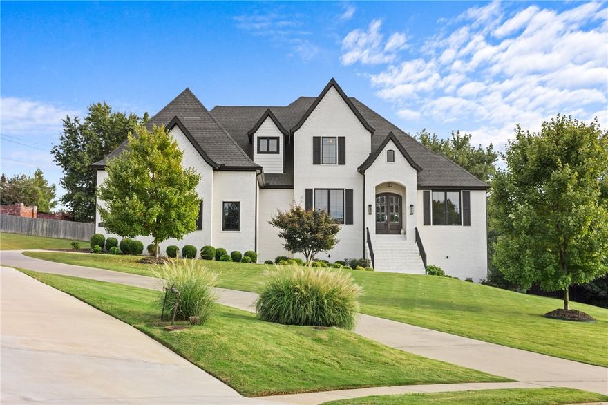 Welcome home to this stunning residence tucked away at the end of a quiet cul-de-sac in the gated Heritage Hills Subdivision! This home offers 4 bedrooms, 3.5 bathrooms, an office, bonus room, plus a large secret room that could be used as an exercise room, craft room, game room or simply for storage! No detail has been overlooked in this thoughtfully designed home. The primary bedroom is located on the main floor. The gourmet kitchen boasts a large island with a wine fridge, double ovens, gas cooktop and more than enough cabinet space. This home is perfect for hosting and entertaining, with the kitchen flowing seamlessly into the living room and the living room opening up to the back covered deck. This exceptional property offers the perfect blend of privacy and convenience. With the short drive to I-49, you can get to all of your favorite spots in Northwest Arkansas within minutes! You have to see this home in person to appreciate all it has to offer!