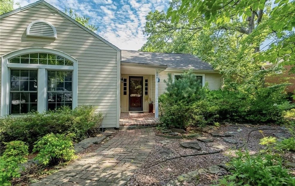 Beautiful 3 bedroom/3 bath house that is in the absolute best location in Fayetteville! The house is situated with walkable access to food, shopping, entertainment and the University and yet it is in the middle of a quiet, family neighborhood. This home was built in the 1940s and boasts an incredible blend of vintage appeal and modern comforts with much of the original architectural character and charm maintained. Whole house has surge protection. The large backyard has a full deck with a large screened in porch overlooking gorgeous low maintenance landscaping.
The home has two levels that offer generous living spaces. Three large bedrooms, two living rooms, a dining room, and an office. In addition, there is a finished third floor that can be used for multiple purposes. Owner made many cosmetic upgrades after purchase, as well as functional, including a new roof (2020), new HVAC (2022), and adding the screened room. This unique property could be used as a primary residence, a second home, or a profitable rental.