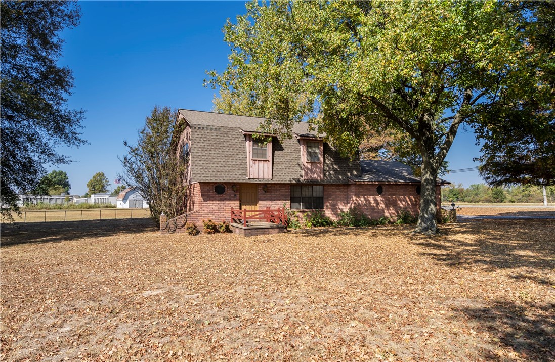 Charming Custom Home on Oversized .69-Acre Lot – Immaculately Maintained! This beautifully maintained custom-built home is nestled among mature trees, on a spacious .69-acre lot. Built in 1978, this one-of-a-kind residence has been lovingly cared for and offers a solid foundation with timeless character throughout. Inside, you'll find a clean and immaculate interior, ready for your personal touch. Whether you're dreaming of a full renovation or just adding your own style, this home is a perfect canvas to renovate and make it your own. The expansive lot provides plenty of room for outdoor entertaining, gardening, a pool, or even future expansion—rare to find in today's market! Home is being sold AS-IS, offering a fantastic opportunity for investors, renovators, or anyone looking to customize their forever home. The house and adjoining land is being marketed/listed together as Commercial MLS#1289097 & Land MLS#1289268.