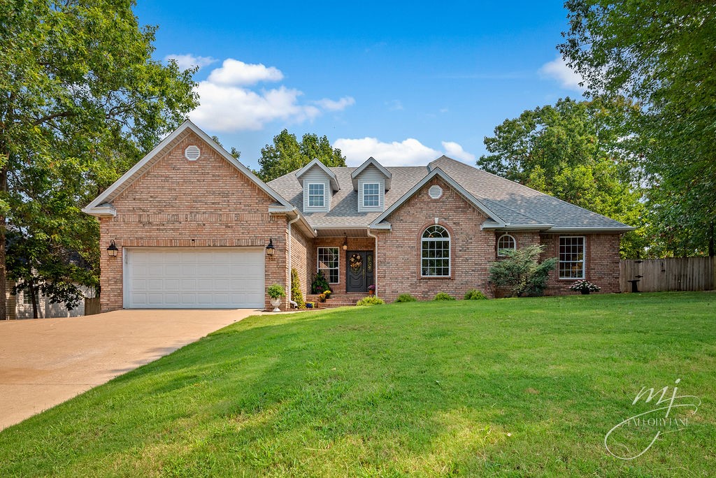 Imagine yourself in this Masterpiece of a Home! Located on a lovely cul-de-sac drive in north Bentonville, the home is close to all the amenities; downtown shopping, Crystal Bridges, and the trail system. Entryway leads into the Formal Dining and open Living Area with a Native Stone, Wood Burning Fireplace, and new Ceramic Tile Floors. New Lighting throughout. Wrap-Around Kitchen includes thick Granite Countertops and Stainless Steel Gas Range. This connects to a spacious Breakfast Nook. Lots of natural light pours into all these Main Areas. Outside, play in the huge backyard. Imagine yourself relaxing on the Covered Back Patio & Deck, grilling and entertaining guests. The Primary Bedroom features an oversized Closet that is a room unto itself. The Primary Bath includes a 3 Mirror Vanity, 2 Sinks, Deep Soaking Tub, and Full Walk-In Shower. Work from home in the Study with finely crafted Built-In Shelving and Wainscoting. Upstairs, find a Bonus Room with its own Wet Bar. Walk-In Attic Storage. This is the Lifestyle!