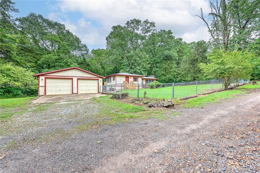 LAKE AREA with Privacy & Bonus Lot makes for a welcoming, peaceful escape! This home is nestled only 1/4 mile to Beaver Lake shoreline, and surrounded by serene woods on three sides, offering the perfect blend of privacy and natural beauty. Enjoy morning coffee or evening relaxation on brand new front and back decks. New carpet, a warm inviting layout that’s perfect for weekend getaways or full-time living. Main Level living welcomes you with a spacious living area, kitchen, and a convenient half bath—ideal for entertaining or relaxing by nature. Downstairs, you'll find two comfortable bedrooms and a full bath. The spacious extra lot included gives you room to expand or simply enjoy the added space. 
Whether you're looking for a cozy personal retreat or an investment property near the water, this property is a must-see! *Back on market, no fault of seller. Up to $2800 in CLOSING COST ASSISTANCE! *with acceptable offer & financing approval from preferred lender. Few photos have been digitally staged