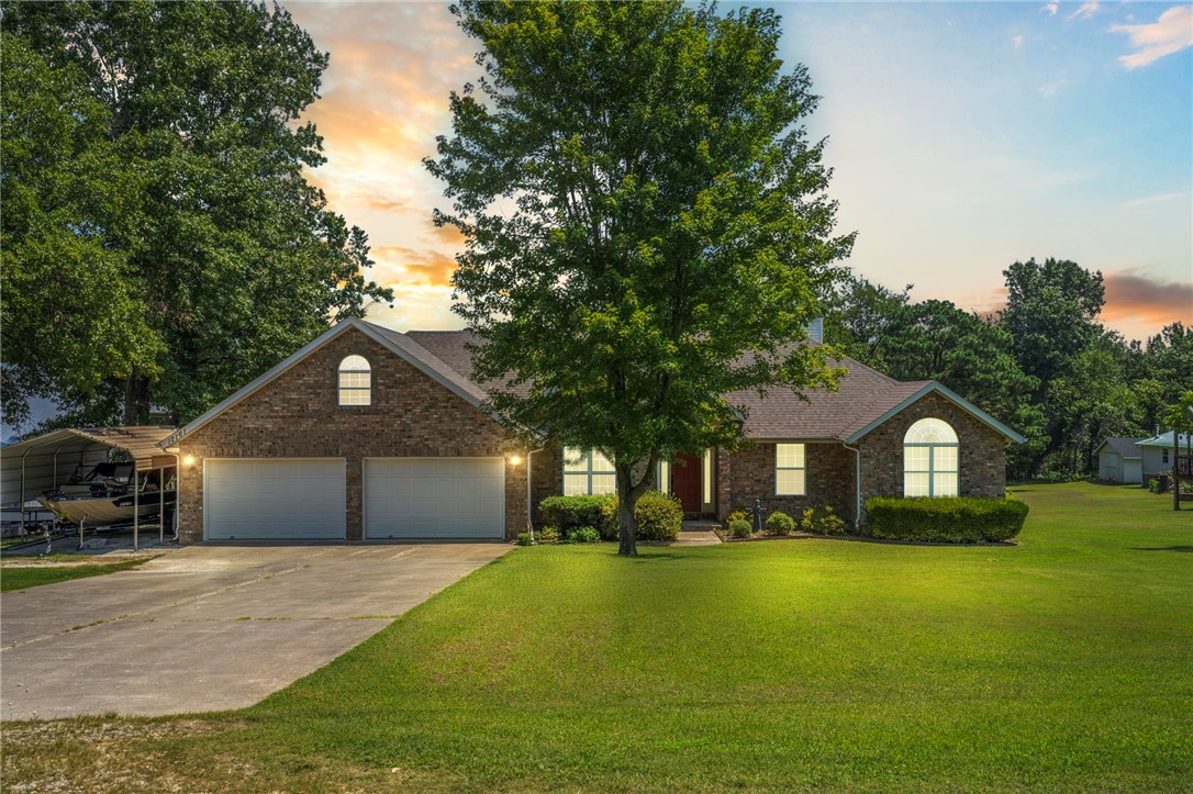 Discover a one-of-a-kind opportunity with this exceptional 2,740 sq ft lake home, ideally situated on a rare flat lot with direct water access and scenic views. All living space is on a single level, including a newer addition that offers panoramic lake and nature views.
The property backs to a serene buffer owned by the U.S. Army Corps of Engineers, ensuring lasting privacy and unspoiled surroundings. A 600 sq ft turnkey shop features electric, water, spray foam insulation, and a wood-burning fireplaceāperfect for hobbies or extra storage.
Set in a peaceful lakefront neighborhood with community boat access, this property blends tranquility and convenienceājust 15 minutes to both Rogers and Fayetteville. Whether as a full-time home or weekend escape, this is your chance to own a true unicornālakefront, flat land, and packed with value.