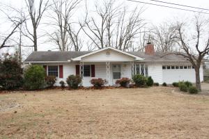 Beautiful near level tree shaded lot in Glen Cove S/D with large sunroom, wood fireplace, large laundry room, 2 car garage, landscaped, right across from Sievert Park. Close to Bull Shoals Lake. All #'s are approx., age & sq. footage per assessor's card. Acreage is an estimate, bank owned property. Asset built prior to 1978 - Lead-Based Paint Potentially Exists. Selling As-Is.