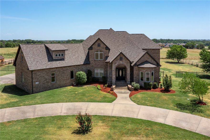 Custom 4bdrm, 3 1/2 bath estate home built by Jim Cooper on 1.7 +/- acres on the edge of Bentonville & Centerton. This perfect floorplan is made for entertaining w/ a large, open kitchen, dining area & family room along with a formal dining and have the perfect view of the sunroom & gorgeous backyard. The master suite resides on the main level, connecting to the home office, while the other 3 bdrms, 2nd living room, oversized bonus room & extra storage are all upstairs. Enjoy the peaceful setting out back on the deck, on the patio overlooking the lap pool or in the gazebo. New roof in 2022. New downstairs HVAC in 2021. Currently being re-parceled.