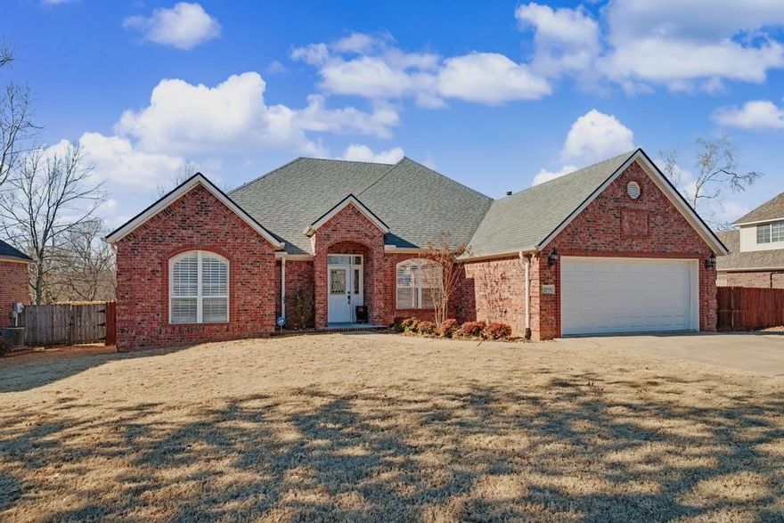 Ideally located near I-49 with convenient access to shopping, dining, and Washington Regional Hospital, this inviting home offers a combination of privacy and connectivity. The property backs to a protected green space that ties directly into the Razorback Greenway, providing miles of access across Northwest Arkansas. Enjoy the outdoors from the private covered back deck with no rear neighbors and views framed by large windows that fill the home with natural light. Situated on an oversized lot with a fenced backyard, this home features high ceilings, crown molding, detailed trim work, and hardwood floors. Recent updates include a new roof and gutters (2020), new carpet (2026), insulated garage door (2025), and a new dishwasher (2024). Smart-home comforts include smart light switches, Nest thermostat, smart garage door opener, and wiring for a security system. With thoughtful updates, beautiful finishes, and unbeatable trail access, this home offers comfortable living in a wonderful Northwest Arkansas location.