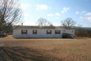 Double wide mobile home as is to be moved. 4 bedroom, walkin closets, 3 full bath, Living room, family room with fireplace, kitchen and dining room.