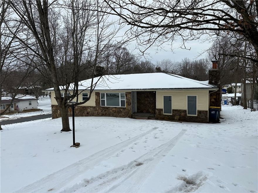 3BR 2BA home on nice corner lot, partial basement with possible 4th bedroom or hobby room, workshop area in the basement, large rock fireplace with gas logs.  Open floor plan with a large kitchen area with plenty of cabinets and counter space, newer gas range.  New vinyl plank flooring, large deck on the back and fenced yard for the kids and pets.