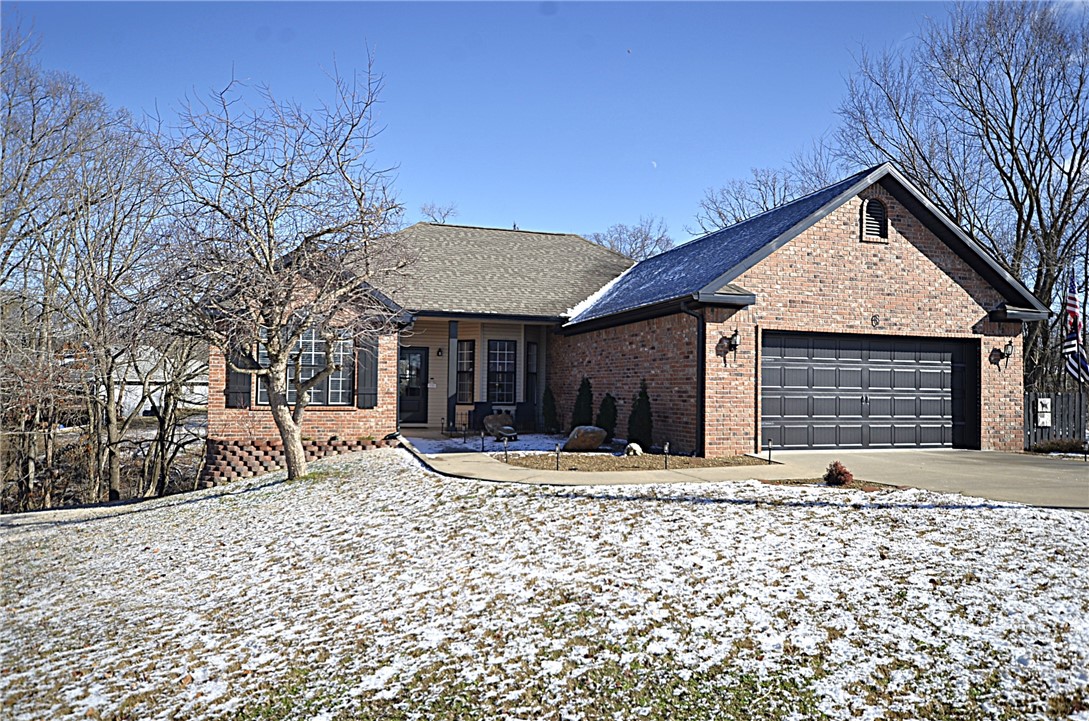 Are you looking for affordability, comfort, a quiet neighborhood that has easy access to I-49 and all that NW Arkansas has to offer? If so, this is it. This 3/2/2 has all this and more. This wonderful home features a split floor plan, fenced back yard, pet-friendly solid surface flooring throughout plus a level driveway on a cul-de-sac street. The back deck is perfect for family BBQ's or to sit and relax and enjoy the peace and quiet that Bella Vista offers. Still need more convincing, access to the Tunnel Vision Trail is less than a mile from your door and offers incredible mountain biking and hiking opportunities. You will also have access to Loch Lomond, Bella Vista's largest lake offering fishing, boating and skiing just minutes from your new home. Plus you will have access to Bella Vista's other 6-lakes, 7-golf courses, firing range (re-opening soon), MB trails and more. So whether you are looking for your first home, your retirement home or investment property, this home checks all the boxes. New roof 9/21.