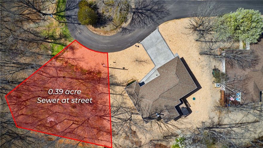 Rare double lot on city sewer near the trails—hard to find in Bella Vista! Located at the end of a cul-de-sac for privacy and views, this property offers a private setting just steps from Bella Vista’s trail systems and the nearby Razorback Greenway. This 3-bedroom, 2-bath home blends privacy with an active Northwest Arkansas lifestyle. Walk to the Metfield Clubhouse with pickleball, pool & golf, plus quick access to the Back 40.
Open floor plan with oversized 2-car garage—perfect for bikes, gear, and projects.
Recent updates include NEW HVAC and newer roof. City sewer, a valuable Bella Vista feature. Relax on the deck or unwind in the hot tub with peaceful wooded views, plus direct access from the primary bedroom.
True bike-in, bike-out location with direct access to the Back 40 singletrack and the Razorback Greenway. Near Back 40 trailhead access.
Convenient to Walmart, Bentonville, and just a 15-minute ride to the OZ Trails Bike Park featuring a chairlift with bike lift. Opening Summer 2026.