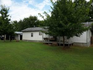 EASY LIVING in this 2 bedroom, 2 bath home that offers two living areas 22 X 14 addition offers a great family room, open kitchen to the livingareas. The back yard offers a privacy fence. Large Garage/Shop, 2 carports for more covered parking and a covered front porch. Call for yourshowing today