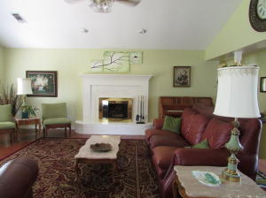 Deer Run location so convenient to the schools, medical and shopping. Nice finishes on the inside include granite counter tops, wood floors and recentlypainted interior. 2 1/2 baths with a spacious master suite include updated tiled walk- in shower and 2 walk-in closets. Enjoy your mornings and afternoons on the covered patio and landscaped yard. Roof 2015 replaced