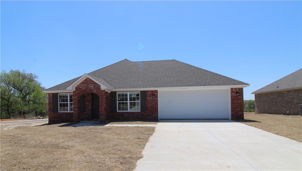 Zero down payment for RD qualified buyers! This beautiful 4 bedroom, 2 bathroom home is RD eligible! Well-appointed 1654 sq ft 4BR/2BA home in country setting. Beautiful dark stained cabinetry and flooring provide a sense of elegant living throughout the home. Attached 2-car garage and ample closet space in each room. These homes include: Full Blinds, Stainless steel appliances: Range, Dishwasher, Microwave, and Garbage Disposal. Washer/Dryer are not included.