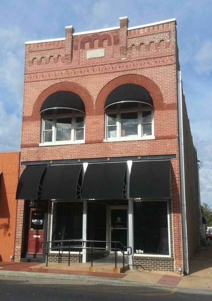 Right in the heart of Downtown Bentonville! THIS FULLY LEASED property makes it a prime investment.