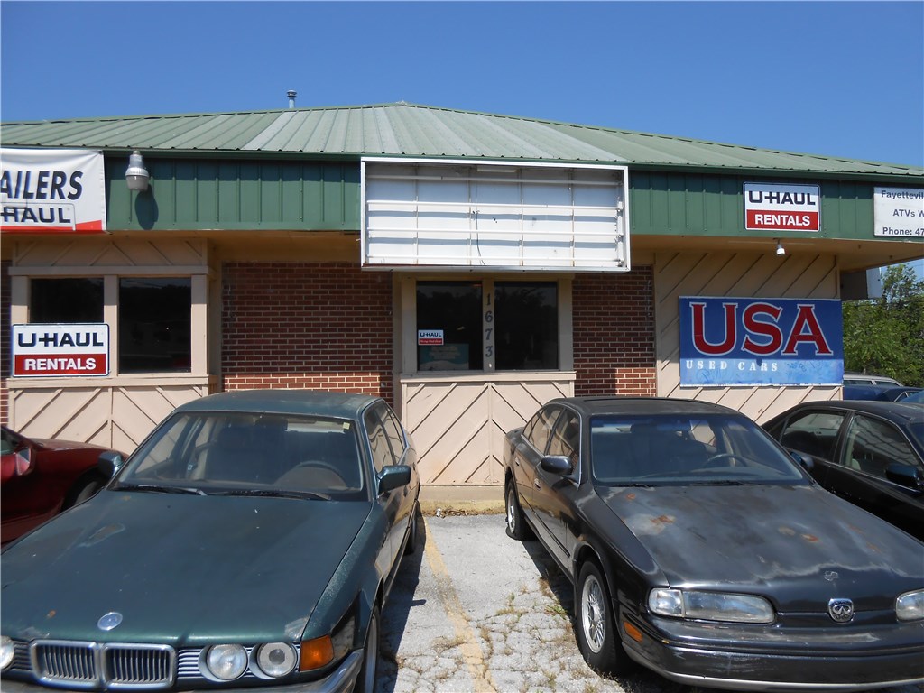 Fantastic commercial property in center of Fayetteville business district. Business 71. Hard corner with traffic light entrance from College Ave and E Sycamore S. Survey and appraisal completed. Show during business hours.
