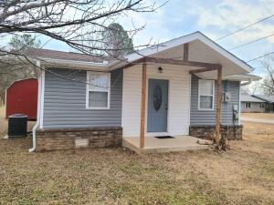 Doll House Deluxe! Check out this super cute tiny home on 2 lots. There are 2 bedrooms, and 1 full bathroom with a walk-in tile shower. All appliances including washer and dryer convey with this cute custom kitchen complete with concrete countertops. There is an almost brand-new storage building and a gravel RV pad. This home sits on a corner lot and is located just down the street from all the conveniences that Magazine offers. This area offers great fishing lakes nearby and is close to one of the nicest State Parks in Arkansas.