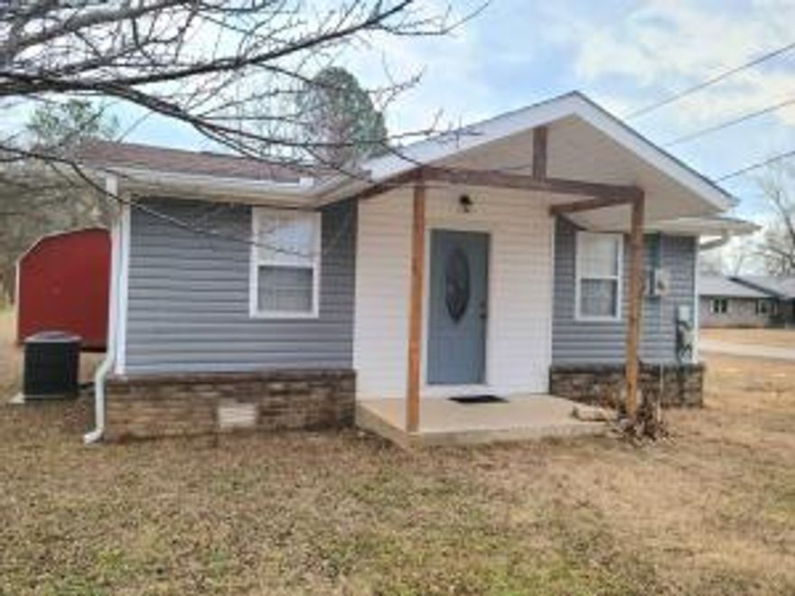 Doll House Deluxe! Check out this super cute tiny home on 2 lots. There are 2 bedrooms, and 1 full bathroom with a walk-in tile shower. All appliances including washer and dryer convey with this cute custom kitchen complete with concrete countertops. There is an almost brand-new storage building and a gravel RV pad. This home sits on a corner lot and is located just down the street from all the conveniences that Magazine offers. This area offers great fishing lakes nearby and is close to one of the nicest State Parks in Arkansas.