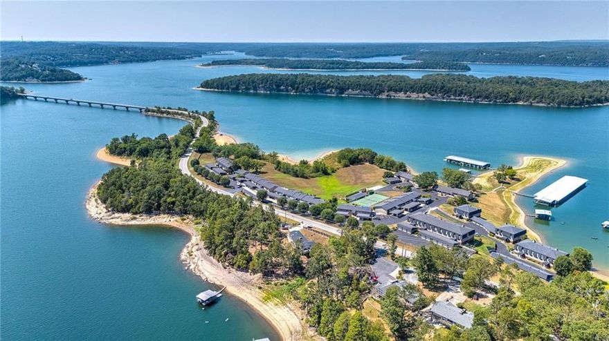 Beautiful Lakefront Condo on Beaver Lake! In the highly coveted Heritage Bay, this 3BR/2BA condo has all of the upgrades! Newly updated Bathrooms, All new Hardwood Floors, new paint and more! Enjoy Stunning lake views from your covered patio, and the peacefulness of lake life, while only being 10 minutes from Downtown Rogers and all it has to offer! Move-in ready and perfect for full-time living or your weekend getaway!