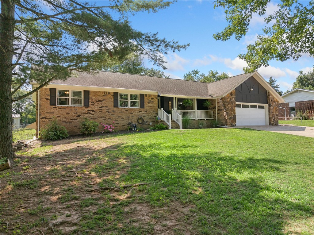 Completely updated and move-in ready! This beautifully remodeled 4-bedroom, 3-bath home in Southern Hills Subdivision offers 2,603 finished square feet, including a walk-out basement with over 600 square feet of additional living space. Located on a quiet dead-end street, this home features an open floor plan, a spacious kitchen with a large island, custom vented hood, and a reverse osmosis water filtration system. The primary suite includes a double walk-in shower and jetted tub for a spa-like experience. Outside, enjoy two outbuildings, a backyard garden, a chicken coop, and a dedicated parking pad for your RV. A brand-new roof will be installed prior to closing, and the buyer can help select the style and color. With tasteful updates throughout, this home offers comfort, function, and charm in one ideal package.