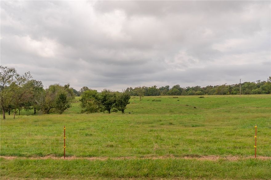 Acreage near XNA provides endless potential! Level land in fast-growing area is perfect for residential development, small farm or cattle operation, or commercial use. This prime location plus open possibilities equals a smart investment, offering a blank canvas to your vision, whether you want to farm, develop or invest in the future. Coming soon is Hwy 612 which exits at the XNA entrance making this property easily accessible to all of NWA.