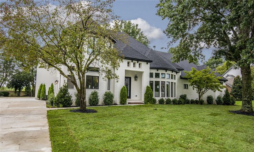 ANOTHER CLASSIC SHOWSTOPPER BY WAYNE BRYANT!!  Completely rebuilt in 2019 with top of the line amenities throughout!  Beautiful open floor plan with stunning chef’s kitchen open to spacious living with fireplace and walk-out breakfast area.  Main level master suite with luxurious en suite bath and fabulous walk-in closet with built-ins!  Spacious formal dining and main level guest suite.  Second level hosts large bonus room plus 2 additional bedrooms each with a private en suite bath.  Exceptional quality in the prestigious Pinnacle County Club!  Close to everything Rogers has to offer!