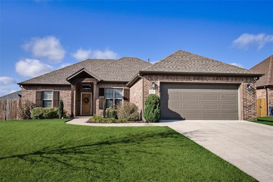 This well cared for open concept four bedroom/2 bath home is just what you have been looking for.  Living room is anchored by a lovely fireplace that is flanked on the side by cabinetry and open shelving. The eat in kitchen has plenty of cabinets, granite countertops, subway tile backsplash and roomy pantry with additional kitchen storage located in an adjacent hall closet. Large primary bedroom and bath with super spacious closet!  ***NEW ROOF**** Covered patio and additional concrete pad perfect for grilling out or enjoying a fire pit on those chilly nights.