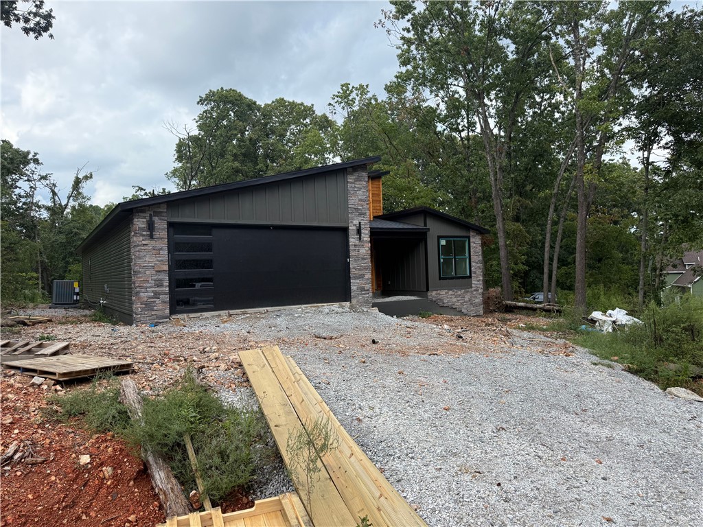 Beautiful contemporary new construction on a flat lot! This 3-bed, 2-bath home features an eat-in kitchen with waterfall island, one-piece backsplash, electric range, a hidden walk-in pantry, and an office. No carpet—just tile and premium LVP throughout. Built with Zip System sheathing and Solar Board roofing to keep the home energy-efficient and the attic up to 40° cooler in Summer.