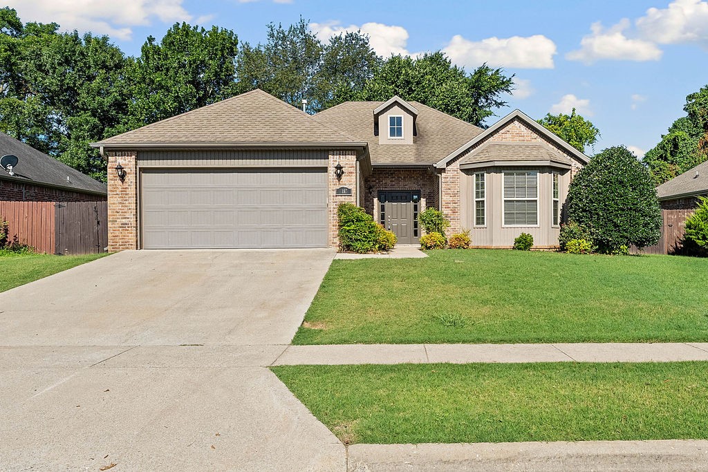 Welcome to this quiet neighborhood that is only about 10 minutes to the University of Arkansas. The fantastic curb appeal takes you down the sidewalk to the front porch where you will swing open the front door and you are greeted by luxury vinyl plank throughout the living areas. The living room features a nice corner fireplace and a wall of windows beaming natural light. Move through the living room to the large kitchen with granite countertops, lots of cabinets, stainless appliances, including a refrigerator, granite island and a dining area. The large primary features luxury vinyl plank flooring, tray ceiling and an ensuite with dual vanities, jacuzzi tub, shower and huge walk-in-closet. Two more bedrooms and a bathroom are on the other side of home for the kids. Out back you can relax under the covered area in the private flat, fenced backyard with no neighbors or homes behind you. This home is move in ready as the entire interior was painted in Spring of 2023. Area is school of choice.
