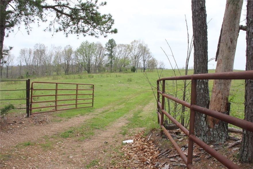 Have your working cattle farm with big views right off a paved state highway. This 776.89 acre farm has 5 ponds, one spring and sugar orchard creek on it. Many building sites and roads throughout the property. Two hay fields and two hay barns and two iron working pens. Both gates off Hwy 125 have been redone with iron fencing set back to allow for a truck and trailer.  Properties like this are few and far between, don’t miss out!