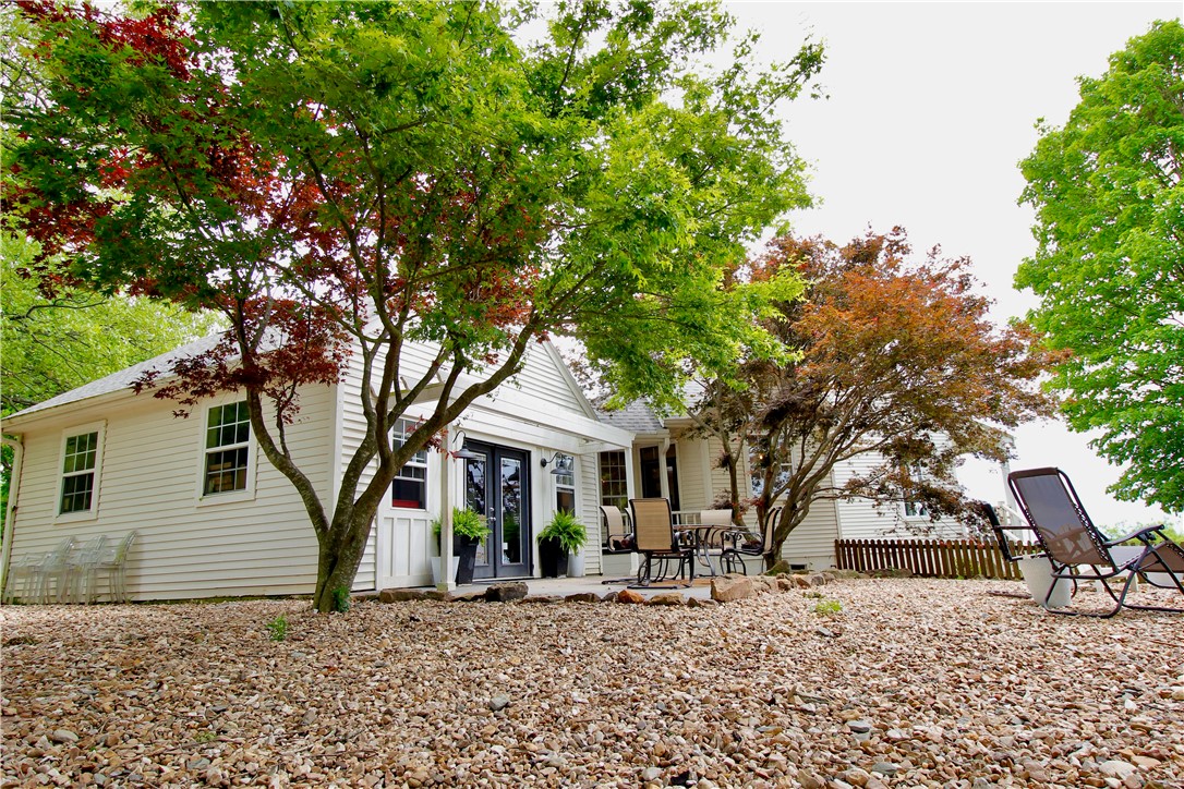 Welcome to your farm house country retreat! This charming 1,667 square foot home features cedar siding and boasts a blend of wood and tile flooring throughout. With 3 bedrooms and 2 baths, this home offers ample space for both relaxation and entertainment. Additionally, a 440 square foot detached office or game room provides the perfect flex space for work or play, complete with a built-in storm shelter in the floor for added peace of mind.
Nestled on 100+/- acres with 86+/- acres of timber and 14+- acres native pasture, this property offers endless opportunities for outdoor enjoyment. Whether you're fishing in one of the three ponds or exploring the forest teeming with wildlife, there's something for everyone to enjoy. There's also a 18x20 metal outbuilding, perfect for storing equipment. Plus, with south-facing mountain views, every day is a feast for the eyes. Conveniently located just 30 minutes from the natural wonders of Devils Den State Park and 43 minutes from the vibrant culture of downtown Fayetteville.