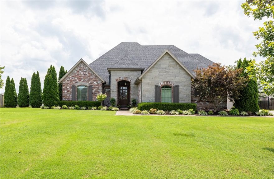 Gorgeous home in East Fayetteville’s highly sought after Waterford Estates Subdivision!  3,622 heated sq ft offers 4 bedrooms, 3 full bathrooms, 1 half bathroom, study, great room open to eat in kitchen, formal dining room, laundry, and a bonus room.  3 of the bedrooms are on the main level!!  Other amenities include hardwood floors, vaulted ceilings with exposed beams, SS appliances, pot filler, walk in pantry, outdoor fireplace, covered patio, fully fenced backyard, 3 car garage, new roof in 2023, and a private IN GROUND POOL with a waterfall feature.  Don’t miss the community pool, clubhouse, river access, and community ponds.  Zoned for Vandergriff Elementary.