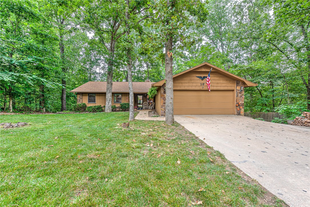 Perfectly located for nature and adventure, this Bella Vista home sits just up the street from Lake Avalon Beach and popular mountain bike trailsāBamboozled is right in your backyard! Zoned for the coveted Bentonville School District. The home offers a nice size office, a screened-in back porch, and a private deck off the primary bedroom. A spacious golf cart garage with abundant storage or space for a work room is tucked along the side of the home. Recent updates include a new water line, drinking water system, and water softener. Relax on the screened-in porch and enjoy serene views of the tree-lined lot while being minutes from all Bella Vista has to offer! On the Sewer Connect List.