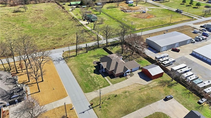 Beautifully updated home on nearly an acre in Lowell, just west of I-49. Step inside to find granite countertops, fresh paint, and a newer roof (2019) along with hardwood and tile flooring throughout much of the main level. The layout offers three bedrooms and three full baths downstairs, plus multiple living and dining areas that make it easy to spread out or entertain. Upstairs, a private suite with a full bath works well for guests, an office, or any other use that fits your lifestyle. Outside, enjoy a covered patio overlooking the large yard and a 30×30 workshop that’s great for projects, storage, or extra parking. Tucked away on a quiet cul-de-sac off Highway 264, this home offers the perfect mix of privacy, space, and convenience—just minutes from Bentonville, Rogers, and Fayetteville.
Flexible terms available, including potential owner financing