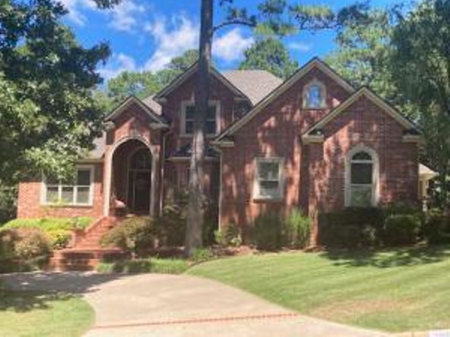 CUSTOM DESIGNED, ONE OWNER HOME on a 3/4 acre lot with 4 BR, 4 full BA, and 2 half BA, has two living areas, formal dining room, spacious eat-in kitchen, and office, plus an upstairs playroom/hobby room and a completed basement with a bonus room, full bath, storage room and attached  workshop/storage.  Updated throughout and loaded with custom features and storage.