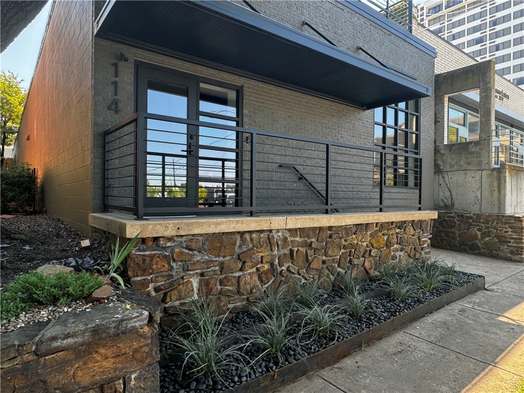 This remarkable five-bedroom property is located only one block from the Fayetteville Square, with EIGHT reserved parking spaces! Recently remodeled with all new finishes and appliances, the house boasts a spacious interior with a unique rooftop patio where you can enjoy city views and entertain guests in style. There are no POA fees or regulations associated with the property. Don't miss out on the opportunity to own this one-of-a-kind home now in the heart of Fayetteville!