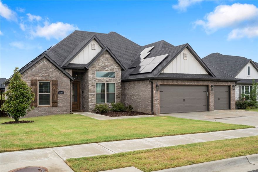 Better than new! This upgraded Pea Ridge home offers modern efficiency and thoughtful design with 5 bedrooms (or 4 + office), 2.5 baths, a split floor plan, and a 3-car garage. Enjoy an open-concept layout filled with natural light, accent walls, upgraded lighting, blinds throughout, and newly painted bedrooms.

Energy savings year-round with paid-off solar panels keeping electric bills under $100/month. Outdoor living shines with an extended covered patio, outdoor fireplace, custom pergola, mature landscaping, and a fully fenced, tree-lined backyard.

Priced at $193/sqft, this home comes in below both the neighborhood active average and recent sold comps — making it one of the strongest values currently available in the community. Move-in ready and energy-efficient, this home truly stands out from new construction. Only 9 miles to the Walmart Campus.