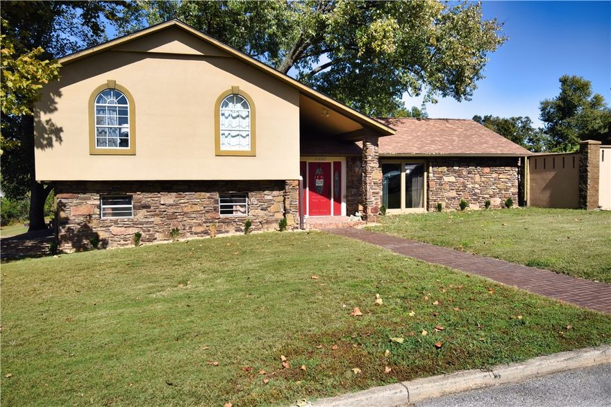 Discover the charm of this split-level 3-bed/2.5-bath home with a bonus level lot. Located on a quiet corner in a well-established Bentonville neighborhood between Downtown & Coler Mountain Bike Preserve—quick access to the square, coffee shop, trails, dog park, schools, grocery stores, & the Greenway. Remodeled upstairs (9/2024) with LVP flooring, new walls, fresh paint, crown molding, updated fans & fixtures.  Fireplace, inground pool, detached garage, & a 1,900 sf garage/workshop with electricity—ideal for extra parking or hobbies. Enjoy the peace of a low-traffic street—great for kids on bikes. Whether you’re an outdoor enthusiast or love Bentonville’s amenities, this location offers the best of both worlds. Make this versatile property your own!