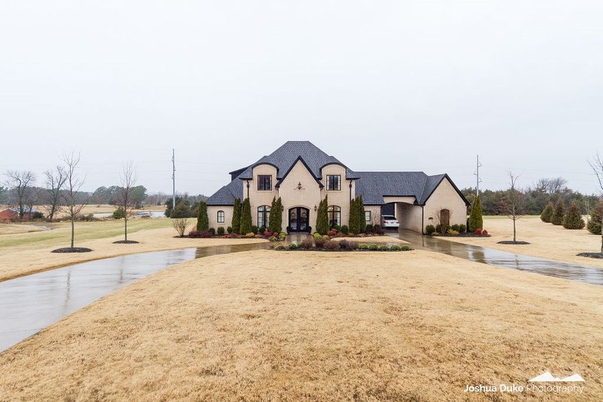 Fantastic East Fayetteville Bridgewater Estates Home situated on 2.01 acres!  4,534 heated sq ft features 5 bedrooms, 3 full and 1 half baths, study, formal dining, oversized kitchen open to living, separate laundry and mud room, and bonus room.  Other amenities include 2 bedrooms on the main level, hardwood floors, commercial grade appliances, Jeldwen casement windows, 2 fireplaces, wet bar, private backyard, and more. Grand entrance as well as a portico for a stunning curb appeal.  Vandergriff Schools.