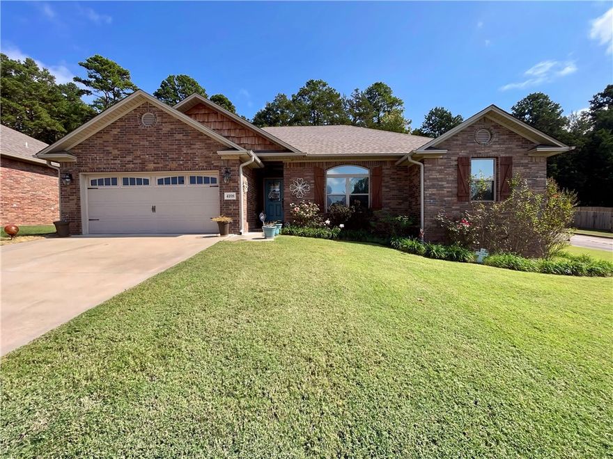 This Gorgeous Shiloh Manor home has been perfectly maintained and is beautifully designed. The open concept living, dining, & kitchen areas, being just off the back patio, make this home perfect for entertaining family & friends. A separate laundry room and additional utility closet create extra storage. Enjoy a modern kitchen with shaker style cabinetry, huge pantry, recessed lighting and staggered upper cabinets complete with crown molding and lazy susans in the upper corners! The Master bedroom is an incredible retreat with recessed lighting, bathroom with double vanities, walk in shower, jetted soaker tub, and 2 walk in closets. Two large guest rooms with walk in closets, privacy fenced back yard that backs up to a quiet forested area, large covered patio and a 2 car attached garage with storm shelter. Corner lot adds extra space for additional parking of vehicles, trailer, etc. This one is truely perfect!!!