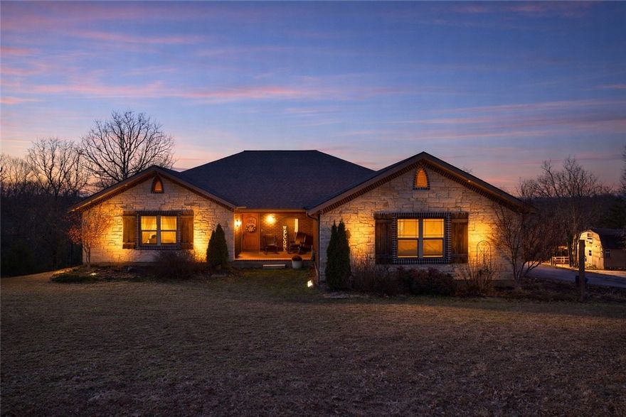 Set on 5 private acres, this Huntsville retreat blends refined comfort with exceptional versatility. The main house (3,492sqft) offers 5 bedrooms and 3.5 baths, featuring an open, welcoming layout ideal for both everyday living and elevated entertaining. Step onto the expansive back deck, an absolute showstopper, where peaceful wooded views create a true sense of escape. The finished walk-out basement adds exceptional flexibility with a storm shelter, and a spacious open area perfect for gathering, hobbies, or extended stays. A detached guest house (464sqft) provides even more opportunity for multi-generational living, guest quarters, or income potential. The private detached living suite has a kitchen, loft bedroom, and bathroom. This property was thoughtfully designed and surrounded by nature, it delivers privacy, luxury, and lifestyle, just minutes from town yet worlds away. Google Maps is not accurate for location. $3,500 preferred lender credit.