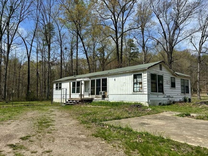 Endless possibilities await on this peaceful 5.43-acre property, just minutes from I-40. This 3-bedroom, 1-bath home is ideal for someone with vision and creativity. While the house needs some TLC, it offers a solid foundation and plenty of space to customize to your liking. Enjoy the tranquility of country living with your own pond, room to roam, and the potential to create a mini-farm, weekend getaway, or your personal escape from the hustle and bustle. Don’t miss your chance to turn this hidden gem into something truly special—schedule your showing today! PLEASE NOTE: This home is being sold AS IS and will require cash or rehabilitation loan.