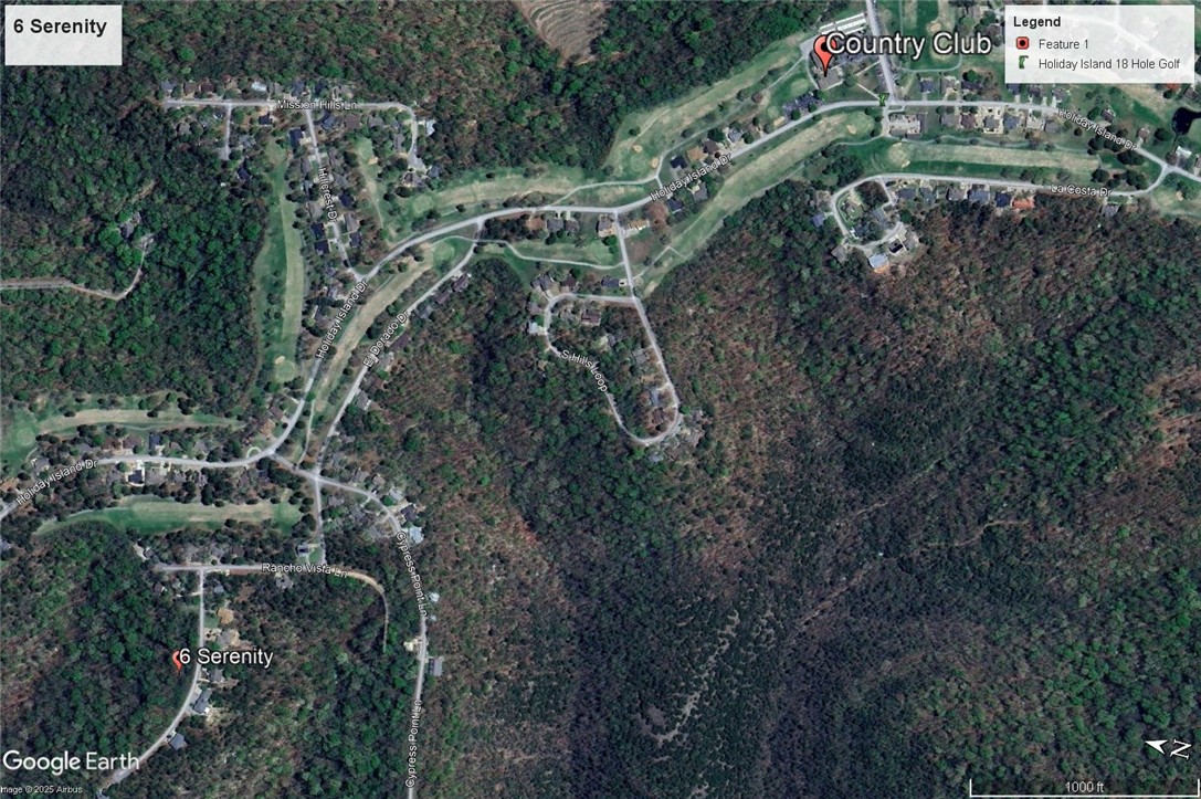Ready to build your dream home? Near the main entrance, your new property is walking distance from the Holiday Island Country Club and golf course. Quiet and gently wooded with beautiful views, this elevated lot offers the best of both worlds. Enjoy the amenities in Holiday Island like golf courses, a country club, swimming, tennis and a marina with a fishing dock or watch the local fauna from your front porch! Nearby Eureka Springs or Rogers offers great shopping and vibrant cultural hubs.