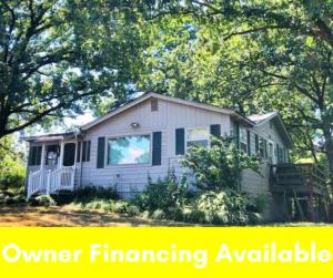 Seller will consider OWNER FINANCING... Love Where You Live! Set in one of Russellville's most sought after neighborhoods, this adorable cottage is minutes from the lake, great schools, and the state park with its scenic views and recreational opportunities! The charming home offers 3 beds, a relaxing screened porch, and a deck overlooking the amazing half acre back yard with mature shade trees and plenty of room to garden, play, and enjoy the good life. Newly installed roof July 2020!
