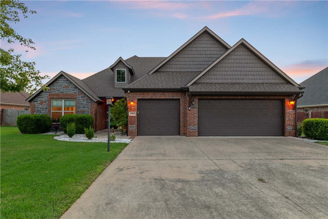 Welcome to this stunning 4-bedroom home, ideally located just steps from the Bentonville Community Center & the scenic Greenway, as well as the community's very own Pool/Park. This home exudes charm & elegance, featuring a spacious bonus room perfect for a home office, playroom, or media space. The formal dining room sets the stage for memorable dinners & special occasions. While the amazing kitchen boasts beautiful granite countertops, ample cabinet space, & modern appliances. The open layout seamlessly connects the kitchen to the living areas, creating an inviting space for family & friends to gather. Each bedroom offers comfort & style, with plenty of natural light & closet space. The exterior of the home combines the timeless appeal of brick & rock, giving it a classic yet contemporary look. The backyard is a private oasis, ideal for relaxing or entertaining. With such a prime location, you'll enjoy easy access to local amenities while living in one of Bentonville's most sought-after neighborhoods.