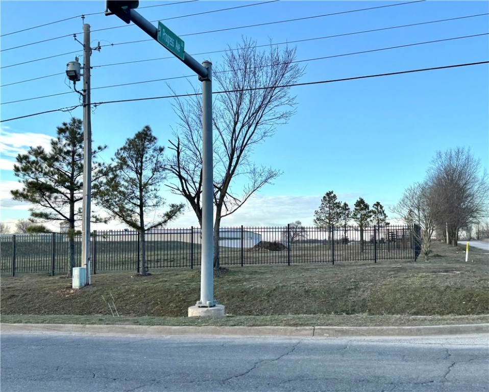 Investors and Business seekers! Opportunity Zone property. Major road frontage on the corner of Cheri Whitlock and Stephens Rd intersection. Other corner properties all zoned Commercial. Wrought iron fencing along both street sides. Just a few minutes from Siloam's school district, hospital, busy shopping district including Walmart and Lowes, and both Hwy 412 and 59. More acreage available. No deed restrictions.