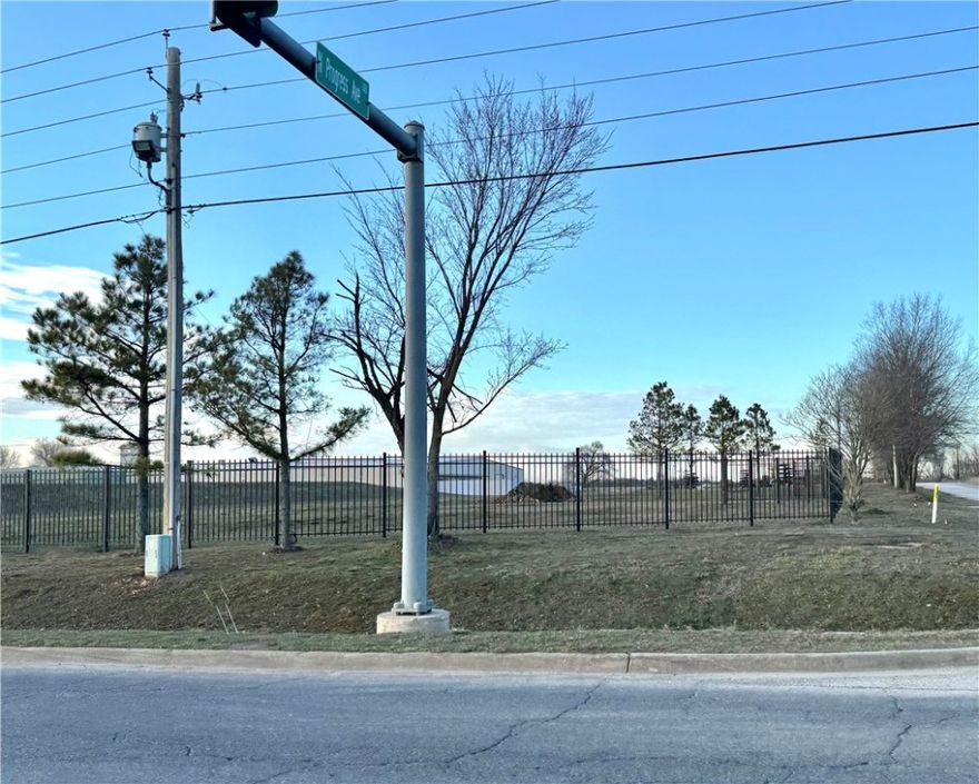 Investors and Business seekers! Opportunity Zone property. Major road frontage on the corner of Cheri Whitlock and Stephens Rd intersection. Other corner properties all zoned Commercial. Wrought iron fencing along both street sides. Just a few minutes from Siloam's school district, hospital, busy shopping district including Walmart and Lowes, and both Hwy 412 and 59. More acreage available. No deed restrictions.